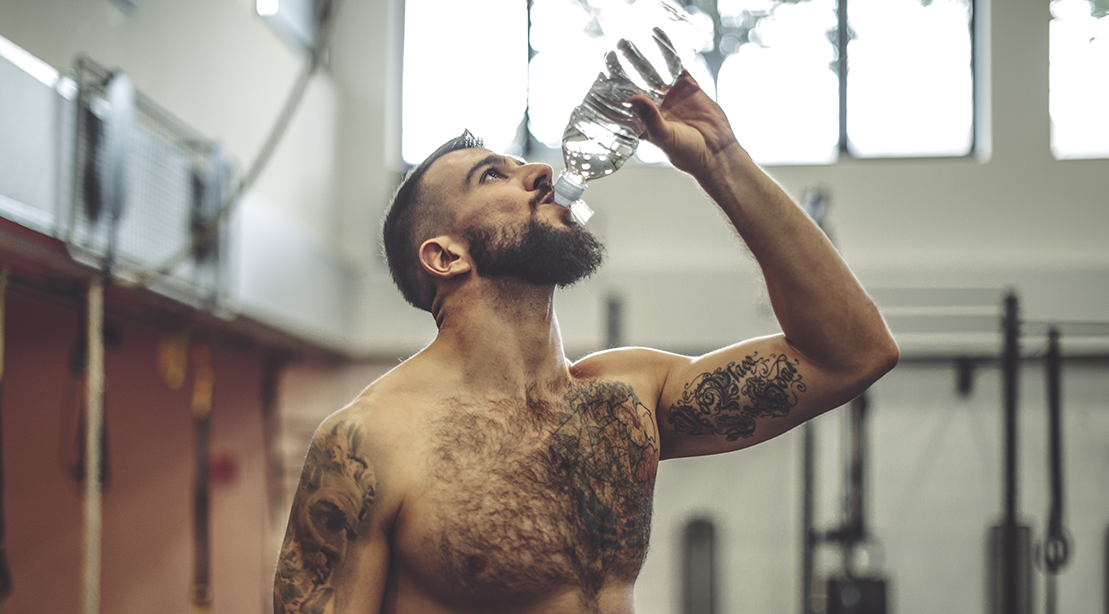 Shirtless Man Drinking Water 