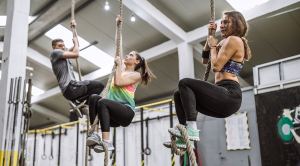 Women Climbing Rope 