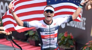 Iron-Man-Racer-Tim-ODonnell-Finish-Line-Carry-American-Flag