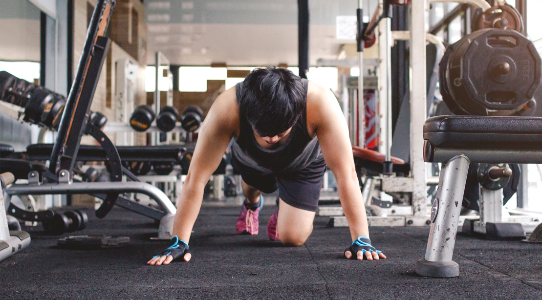 Fitness-Beginner-Crawling-On-Gym-Floor