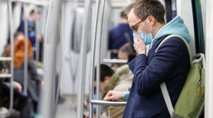 Young-White-Male-Wearing-Medical-Mask-On-Subway-Coronavirus