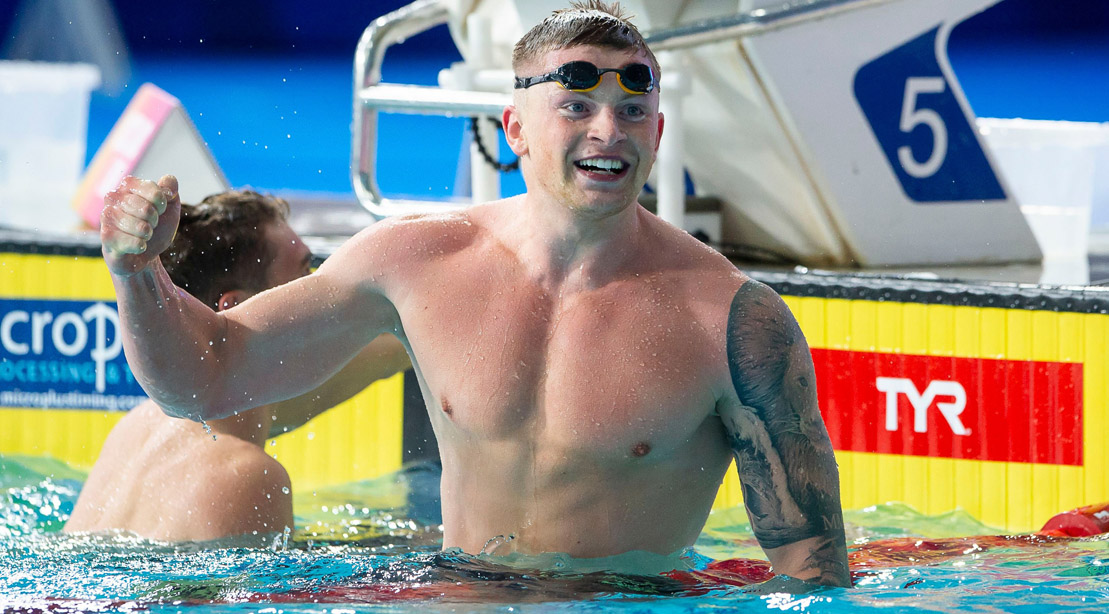 Olympic swimmer Adam Peaty celebrating his win in an olympic swimming pool