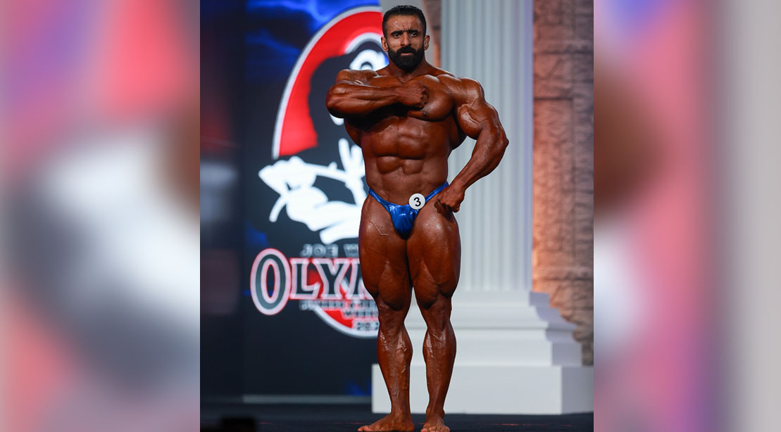 Bodybuilder Hadi Choopin posing at the Olympia 2020 bodybuilding competition