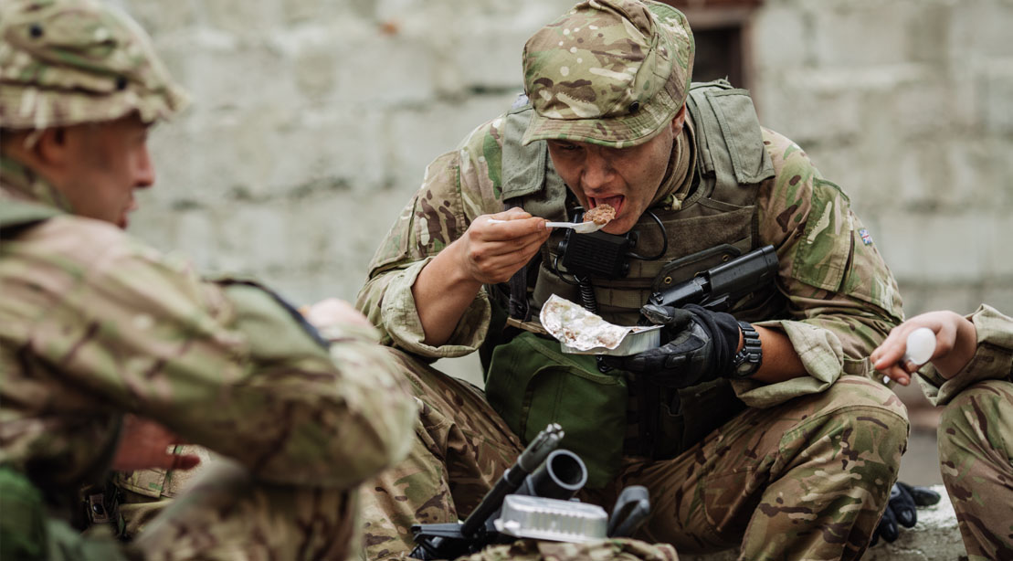 Navy seal training during hell week and practicing the warrior diet while eating a hot MRE meal