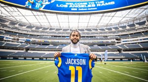 DeSean Jackson Holding a LA Rams Uniform In The Football Stadium