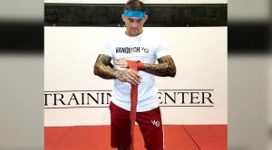 UFC MMA fighter Dustin Poirier wrapping his hands before training