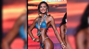 Female bikini competitor Kami Wilkins competition photos in the Armed Forces Nationals