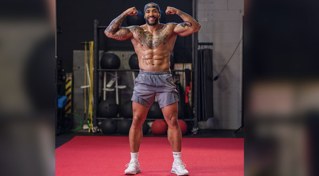 Kickboxer Jason Kalambay showing muscular physique with a kick ass workout