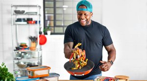 Top Chef Kevin Curry tossing peppers for his quick low carb refried black bean quesadillas recipe