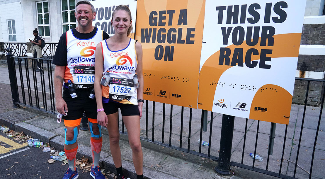 Blind runners Kevin Crompton and his sight guide running a marathon