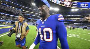 NFL quarterback for the buffalo bill Von Miller walking off the field