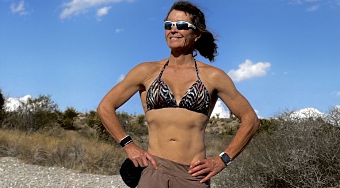 Dr. Jennifer L'Hommedieu Stankus showing her physique outdoors