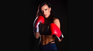 Actress in Movie Til Death Do Us Part Natalie Burns wearing boxing gloves