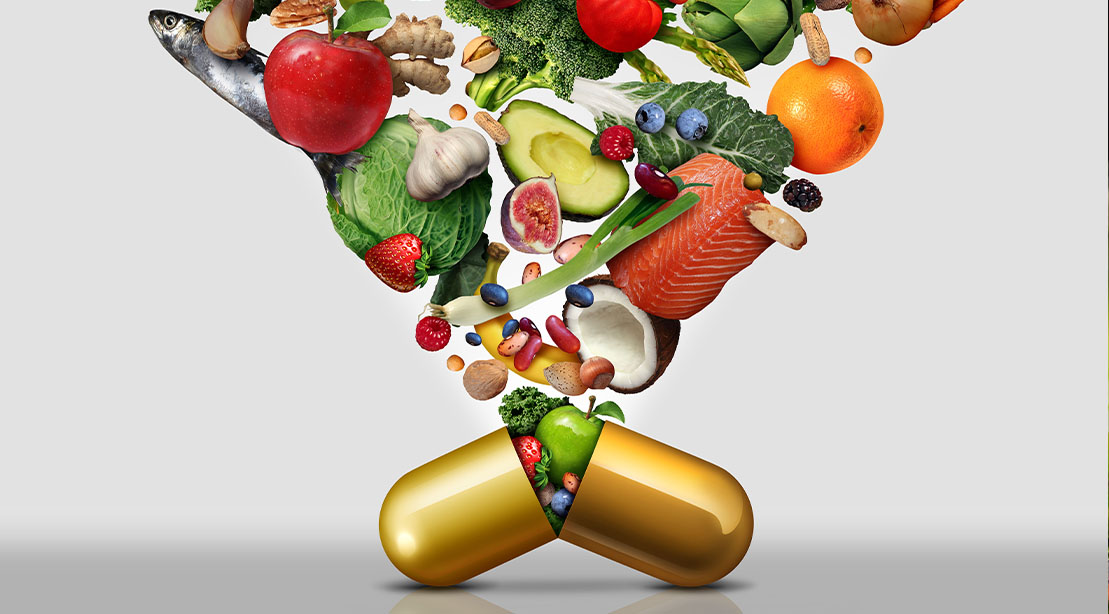Various vegetables loading into a golden pill
