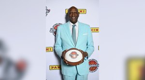 Legendary NBA basketball player Spencer Haywood holding a basketball