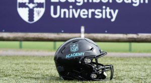 NFL Academy helmet on a sports field in London stadium