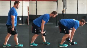 Personal trainer performing a dumbbell death march lunges